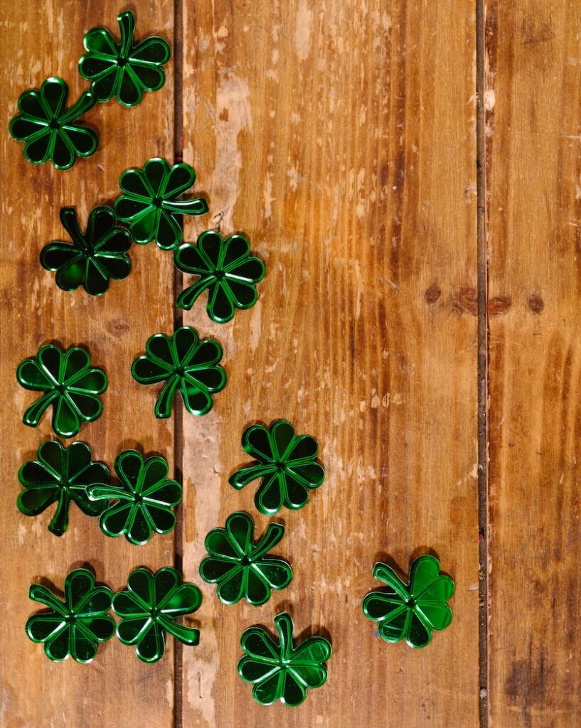 shamrock props on wooden surface