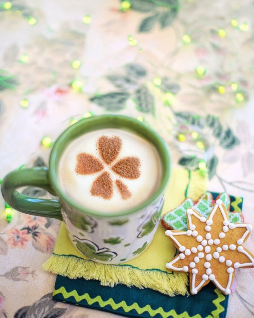 green ceramic mug with coffee