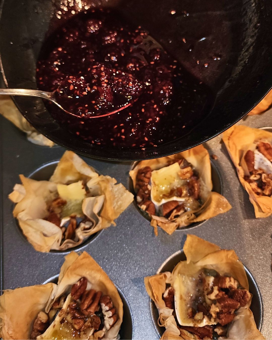 Phyllo Pastry Brie Bites with Blackberry Compote and Pecans 14 These bite-sized phyllo pastry brie bites are a crowd-pleaser. The combination of creamy brie, fruity blackberry compote, and crunchy pecans is irresistible.