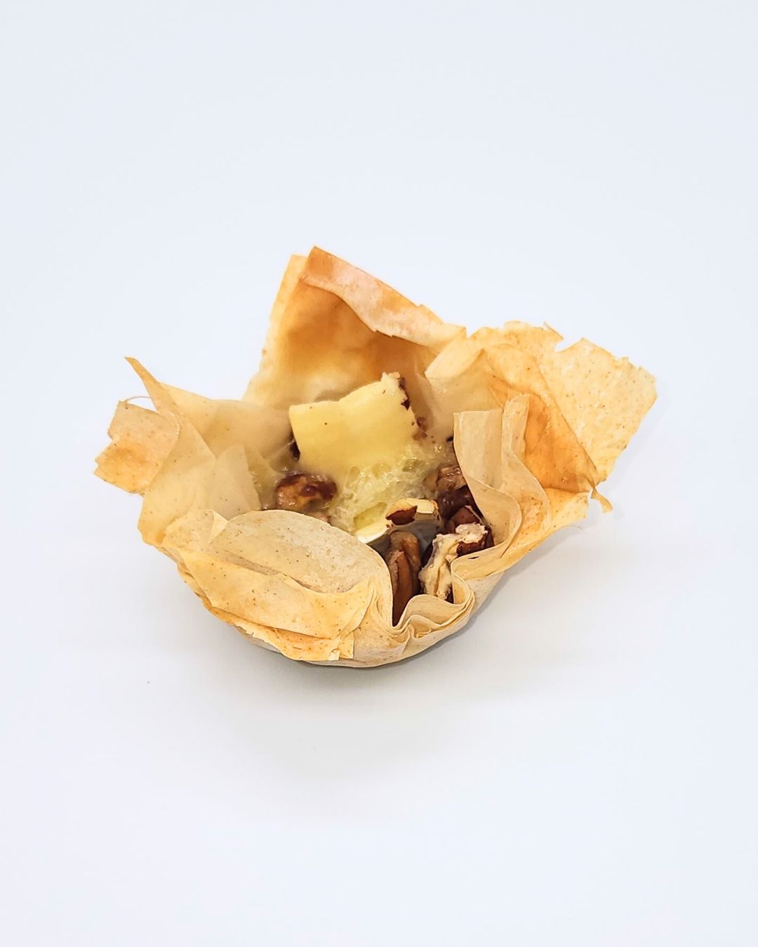 Phyllo Pastry Brie Bites with Blackberry Compote and Pecans 13 Indulge in the irresistible Phyllo Pastry Brie Bites with luscious blackberry compote and toasted pecans. These bite-sized appetizers celebrate the flavors of brie and berries, delivering a burst of deliciousness. Inspired by Halle Berry's child support court victory, try these delightful treats and savor the perfect combination of creamy brie, tangy compote, and crunchy pecans. A must-try recipe for any occasion! 🧀🍇 #BrieBites #BlackberryCompote #AppetizerRecipe #DeliciousBites